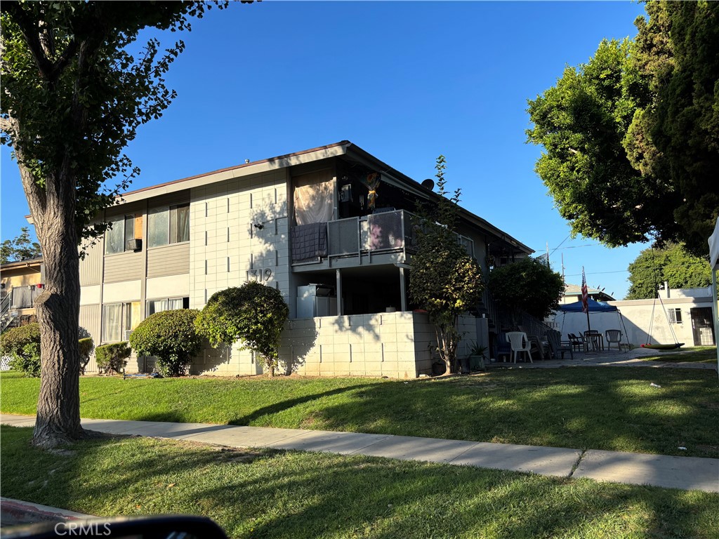 Great investment-- All 2 Bedroom 2 bath fourplex with grassy yards and sprinkler system with timer. Highly desired rental units. Units are spacious at approximately 955 sq. ft. per unit. Features include breakfast bars flowing to dining room. 2 upper units with large covered balconies; 2 lower units with enclosed front patio courtyards. All are end units. Single car garage with newer roll up doors for each unit. Extra 5th garage for owner's use, but can be an extra rental garage, if preferred. Most units have updated improvements--bathrooms, floors, kitchens, lighting. All have a 220 A/C outlet n living room. Community laundry room generates additional income. Placentia Yorba Linda Unified School District attendance area. Located on a pleasant tree covered front yard. near a local city community center and Mira Loma Park. Plenty of yard space to enjoy.