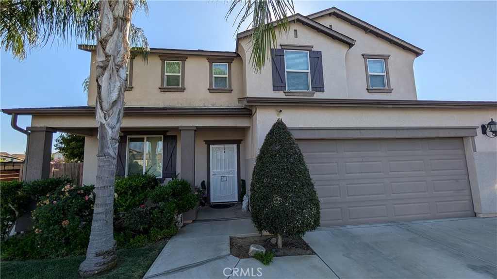 Welcome to this pristine two-story home located in oversized wedge lot. This floorplan provides ample space for daily life and entertaining. You are welcomed with tile flooring on the main level, easy for maintenance and care. Granite countertops are throughout the kitchen and oversized island. Entertaining will be a breeze! The second floor offers laminate flooring throughout. There is a bonus loft perfect for game night or your own movie room. Step inside the primary suite built for a king and queen. Lots of natural light and entry into the bathroom and walk-in closet. Just in time for summer, enjoy your own custom-built pool with custom embedded tile, diving board, and an abundance of concrete for additional lounge space. The exterior covered patio was recently finished offering perfect shade for those warmer evening. Fruit trees line the north side of the property with plenty of fruit to keep your home stocked during all seasons.