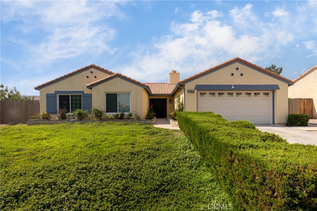 Welcome to this incredible turn-key property in Victorville! This home features four bedrooms and two bathrooms, offering plenty of space for a family. You'll find several key upgrades, including updated windows and an updated security system, providing peace of mind from day one. The property also has leased solar panels, which can help reduce your energy costs.
Inside, a unique dual fireplace connects the family room and dining area, creating a cozy and inviting atmosphere perfect for entertaining or relaxing.
Situated on a spacious 10,000 square foot lot, the outdoor space is just as impressive. You'll be greeted by a beautiful rose garden at the entrance, adding a touch of elegance and curb appeal. The large backyard provides endless opportunities for gardening, recreation, or creating your own outdoor oasis.