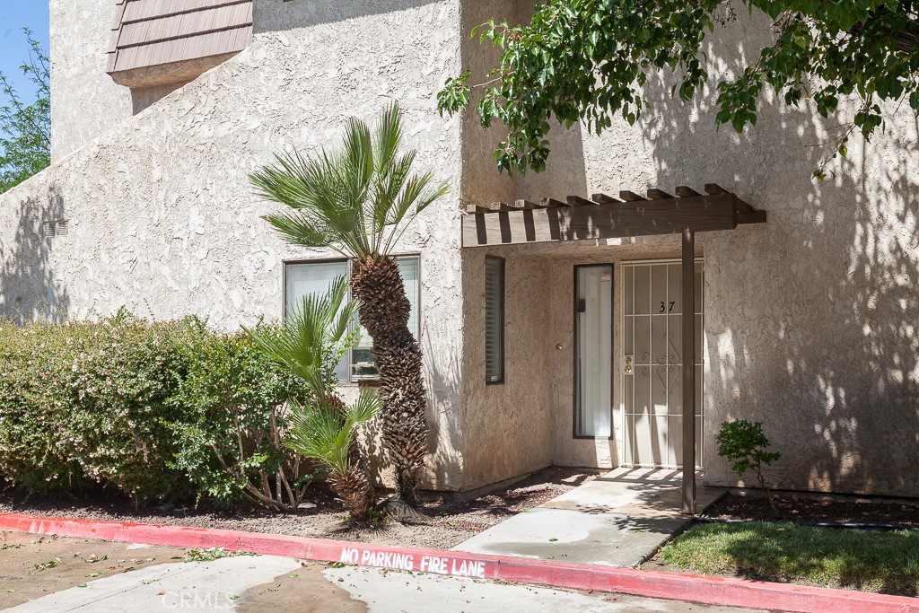 Welcome to this updated 2-bedroom, 2-bath townhome in a gated Lancaster community. With 1,232 square feet of living space, this home offers a smart layout and everyday comfort. The spacious living room features a fireplace and sliding doors that open to a private, covered patio—perfect for relaxing or entertaining. Durable laminate flooring flows throughout the first level, connecting a bright dining area to a clean, functional kitchen with tile counters, ample cabinetry, and updated appliances.
Upstairs, you’ll find two generously sized bedrooms with good light and a shared full bath. There’s also a downstairs guest bath, in-unit laundry, and direct access to an attached 2-car garage.
The gated complex features wide greenbelts, mature landscaping, and access to a community pool and spa—just steps from your door.
