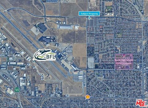 Photo of 0 Merle Haggard Dr / Airport Dr, Bakersfield, CA 93308 (MLS # 26783459)