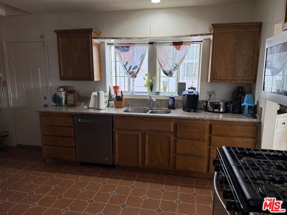 10414 S Denker Avenue