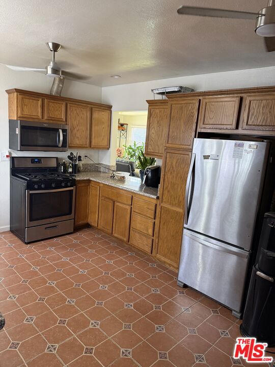 10414 S Denker Avenue