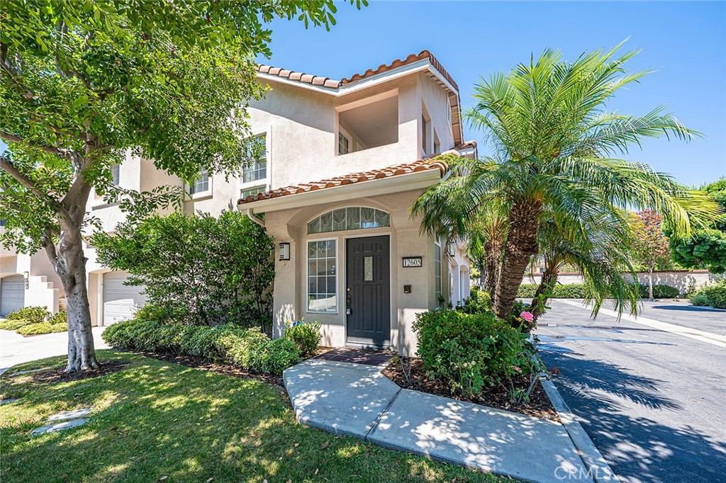 Fantastic opportunity to own this condo located in the beautiful "Gated Ventana Community" of Tustin Ranch. Perfectly located, with no one above or below, this condo offers high vaulted ceilings, great open floor plan, gas fireplace, and private balcony. Brand new laminate flooring through out, plus a completely remodeled master bathroom. Large master bedroom room with three large closets. Master bathroom is big with a huge shower area and double sink vanity. The kitchen is original with lots of counter space and tons of natural light. The hallway bathroom is original with great potential to improve. There is a separated laundry area. Forced air and heat plus large 2 car attached garage with built in shelves. HOA amenities include gated entrance, Tennis courts, Playground, Pool/Spa, BBQ, and a grass picnic area. Award winning TUSD schools, super close to Tustin/Irvine Marketplace. With low HOA's, condo is must see.