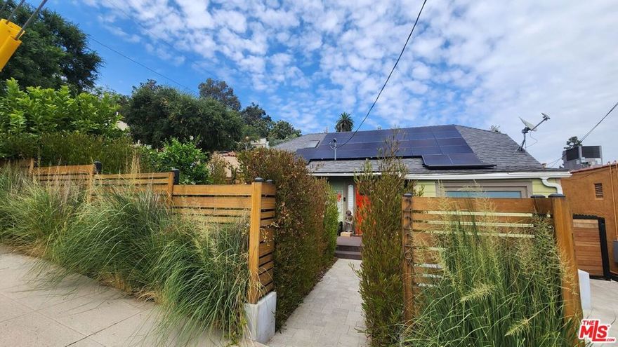 Modern Silver Lake California Bungalow with 2-bedroom, home office, 1-bath, off-street parking and laundry. This jewel features central air and heat, solar panels, serene private outdoor living spaces in both the front and rear yards. Dine alfresco while encircled in the lush drought-tolerant garden. The updated kitchen has plentiful storage, dishwasher, generous cooking space, peninsula island and French door refrigerator. All conveniences have been considered for comfort. Conveniently located close to Downtown LA, many freeways, Whole Foods, restaurants and retail. Seeking one year lease or more. Local owner.  Water, trash and gardener included. Friendly pets welcome with renters insurance.