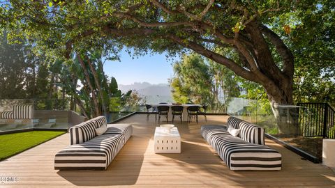 Photo of 9617 Oak Pass Road, Beverly Hills, CA 90210 (MLS # P1-25470)