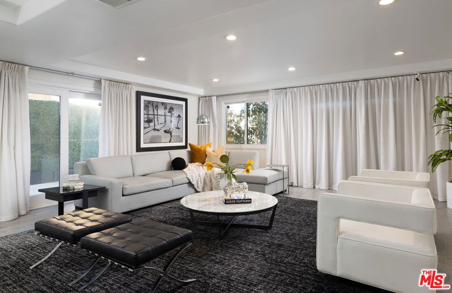One of a kind, expansive 3 en-suite bedroom, 4 bathroom condo in the heart of Beverly Hills. Single story, ground level right across from the Fitness Center. Fully accessible. Located within the prestigious Beverly Hills Unified School District, close to Cedars Sinai, and the upcoming Metro line. Fully remodeled top to bottom with top of the line custom finishes, including CA Closets throughout by Meredieth Baer Design. Primary suite features huge walk in closet and vanity area. Custom furnishings and art also available for purchase separately. Large, walk in private locked storage in garage. 3 side by side reserved parking spaces in gated garage. Additional on site gated guest parking available.