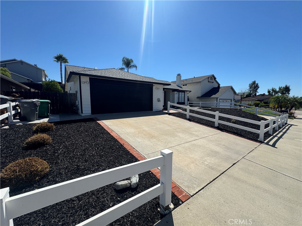 Welcome to 10165 W Glendon Cir, a beautifully updated 3-bedroom, 2-bathroom home in the heart of Santee. This move-in ready residence features newly renovated interior and exterior paint, new carpet in the bedrooms, reglazed showers, and new closet doors. The inviting layout includes a spacious living room with a cozy fireplace, a separate family room, and a bright kitchen with freshly painted cabinets, appliances, and a dining area. The primary suite offers an attached bathroom for added convenience, while the secondary bedrooms are comfortable and well-sized. The exterior boasts new desert landscaping in the front yard, an attached two-car garage with a driveway, and a private backyard with a patio area—perfect for entertaining or relaxing outdoors. With thoughtful updates throughout, this home combines comfort, style, and functionality in a wonderful Santee location.