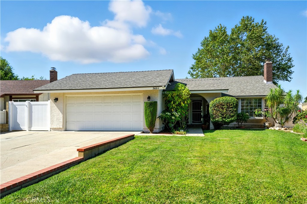 Welcome to this great single-story home in the desirable community of Chino Hills. Offering 4 spacious bedrooms and 2 bathrooms, this home features an open and inviting layout perfect for everyday living and entertaining. As you step inside, you’re welcomed by a warm living room with a cozy fireplace that flows seamlessly into the dining area. The bright kitchen opens to the family room, creating a connected space ideal for gatherings, with sliding glass doors that lead out to the backyard. The primary bedroom offers a peaceful retreat with two mirrored closets, a private ¾ bathroom, and French doors providing direct access to the backyard. The additional bedrooms are generously sized, and a full hall bathroom adds convenience for guests and family members alike. Outdoors, enjoy a spacious backyard with mature fruit trees, a side garden area, and sweeping city and mountain views perfect for relaxing or entertaining. Additional highlights include dual pane windows, recessed lighting, a newer roof, fresh paint, and an attached two-car garage with direct access to the home. Conveniently located near top-rated schools, scenic parks, and a variety of shopping and dining options, this home blends comfort, style, and lifestyle in one exceptional package. Don’t miss this opportunity!