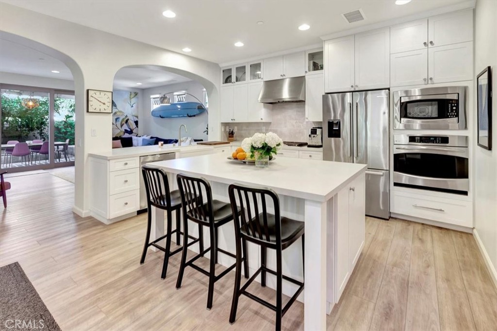 Nestled in the quiet Campanilla neighborhood of San Juan Hills, this beautifully maintained detached 3-bedroom, 2.5-bath home has been tastefully updated with a modern kitchen, refreshed bathrooms, and stylish new flooring. The exterior features newer patio pavers, creating a clean and contemporary look that flows into a privately lit backyard retreat with an inviting outdoor fire pit and a mature passion fruit tree. Thoughtful upgrades include recently replaced Milgard windows throughout much of the home. An optional fourth bedroom conversion upstairs offers flexibility for growing families or a home office.
The community boasts fantastic amenities, including a newly updated sports court with basketball, and volleyball, plus a children’s playground. All of this is just minutes from the charming shops, dining, and historic attractions of downtown San Juan Capistrano. Best yet, NO MelloROOS!