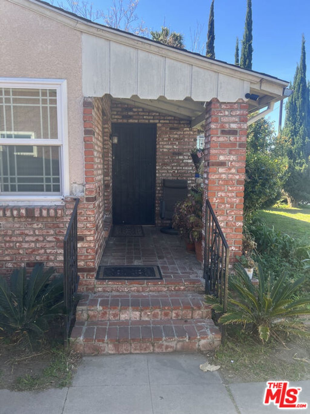 Photo of 1026 W 101st Street, Los Angeles, CA 90044 (MLS # 26663411)