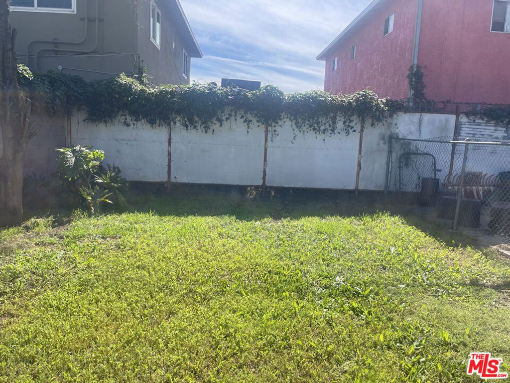 Photo of 1026 W 101st Street, Los Angeles, CA 90044 (MLS # 26663411)