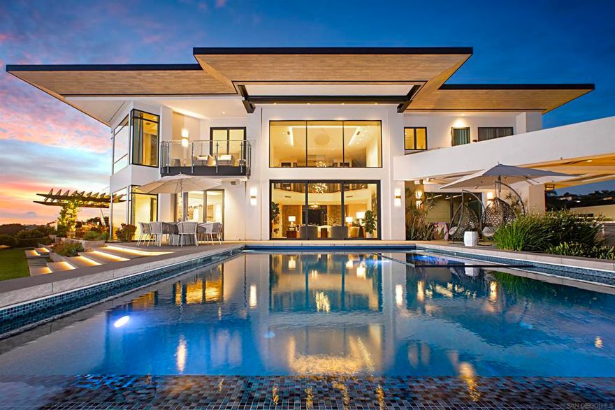 La Jolla’s most expansive view features a 220-degree panorama from this almost one-acre trophy lot. A truly peerless site offers unmatched privacy and recent new construction. It is set with the most desirable southern and westerly unlimited orientation. Rebuilt in 2020, it includes the most current amenities and timeless design. Curated to create a home that lacks nothing to be desired, this serene compound is complete with a two-bedroom guesthouse, secure gated entry, home theatre, gym, infinity-edge pool, spa, elevator-ready setup, solar and battery system, expansive flat yard, full-size volleyball court, designated playroom, enviable his and her closets, and dueling offices. Modern amenities of convenience and comfort fill each living area, combined with unobstructed ocean, bay, island, and city-light views throughout. The interior evokes a sense of awe, while the elevation frames your vantage point for inspiration throughout the day. This is La Jolla’s most complete offering.