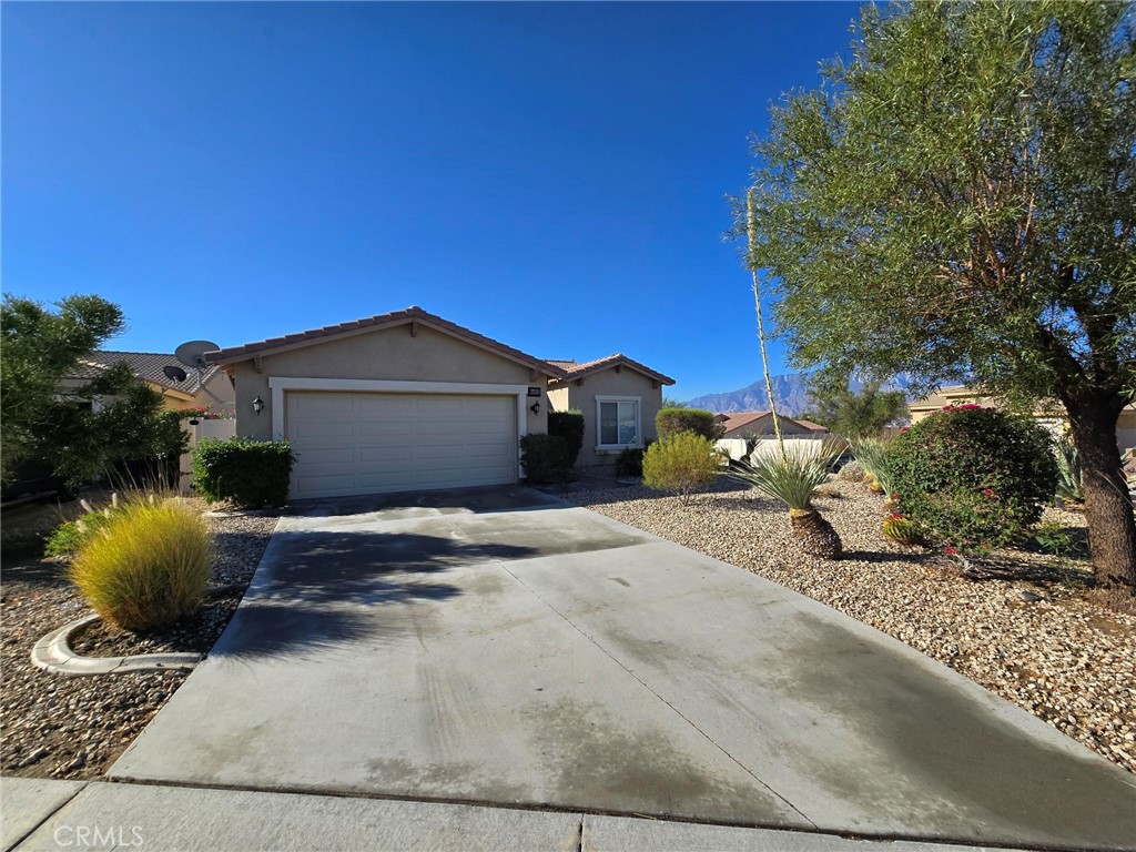 Opportunity is waiting for you to enjoy a beautiful single story home with an open concept floor plan and fantastic views of the San Jacinto mountains. Located in a quiet gated community, tucked inside Mission Lakes Country Club area is Mountain View Estates. This home feature 2 bedrooms, two bathroom, laminate flooring throughout, granite countertops in the kitchen, separate laundry room, perimeter vinyl fencing, leased solar to keep your power bill low, water conserving landscaped front yard, steps away from one of multiple community pools, basketball and tennis court. The backyard is a blank slate for you to create your dream backyard. Low HOA fees as well!