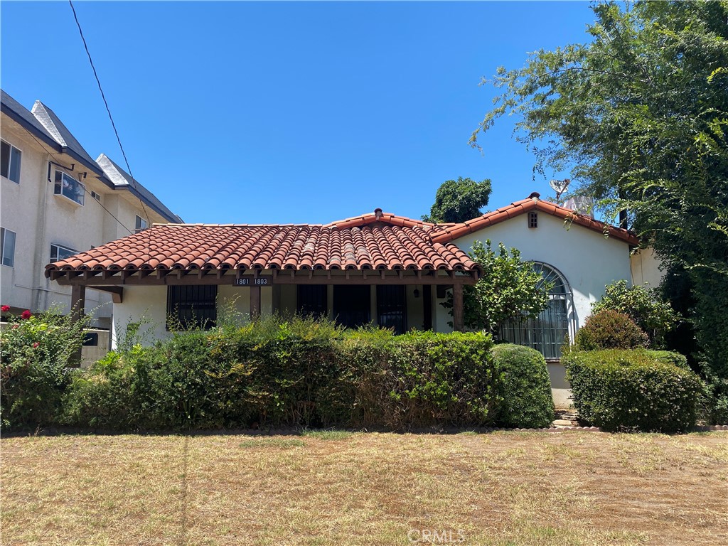 Welcome to this beautifully maintained Spanish-style home offering a perfect blend of classic charm and modern updates. This spacious 2-bedroom, 1.75-bath residence features elegant hardwood flooring throughout and a bright, airy layout ideal for comfortable living. Step into the inviting living room, complete with a stunning coved ceiling and a large picture window that fills the space with natural light. The generous dining room flows seamlessly into a remodeled kitchen boasting sleek quartz countertops, ample cabinetry, and a cozy breakfast area—perfect for morning coffee or casual dining. Both bedrooms are generously sized, and the updated bathrooms offer stylish fixtures and finishes, including a modern ¾ bath for added convenience. Additional highlights include a spacious in-house laundry room, a welcoming front porch, and a private back patio ideal for relaxing or entertaining. A 1-car detached carport completes this lovely home, located in a desirable neighborhood with easy access to local amenities. Easy access to FWY 10, 110. Minutes away to Costco, local shops, park and school. Don’t miss the opportunity to lease this unique and charming Spanish-style gem! This is a 2 units on the lot!