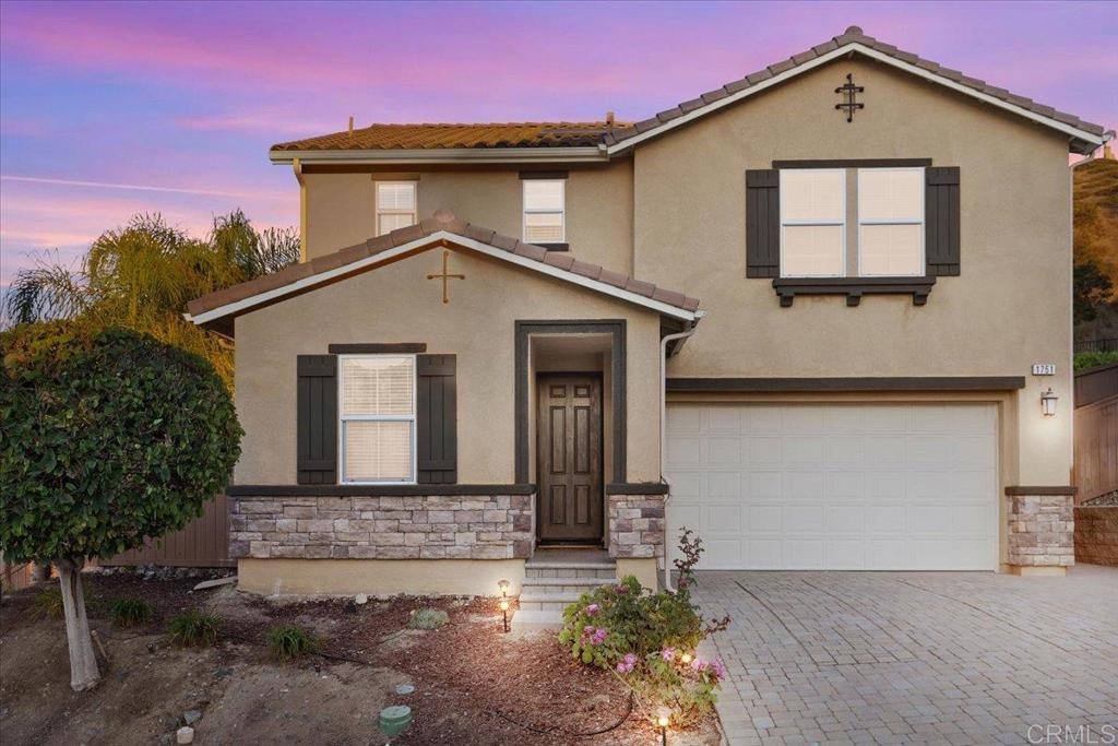 Welcome to this beautifully maintained 4-bedroom, 3-bath home in the desirable Rancho Santalina community of San Marcos! Built in 2013, this spacious 2,376 sq ft residence features an open-concept floor plan with a bright great room, modern kitchen with granite counters, stainless-steel appliances, and a large center island—perfect for entertaining. The downstairs bedroom and full bath are ideal for guests or a home office. Upstairs offers a generous loft, convenient laundry room, and a luxurious primary suite with a walk-in closet and spa-like bath. Energy-efficient with owned solar and dual-zone HVAC. Enjoy outdoor living with a private, low-maintenance backyard featuring paver patio, mature landscaping, and no rear neighbors. Located near top-rated schools, parks, and shopping with easy freeway access. Low HOA, no Mello-Roos—move-in ready and beautifully upgraded throughout!