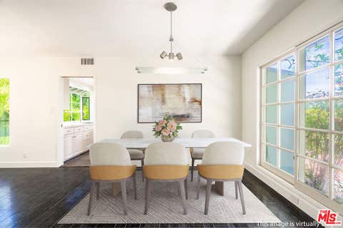 Photo of 4645 Petit Avenue, Encino, CA 91436 (MLS # 26789837)