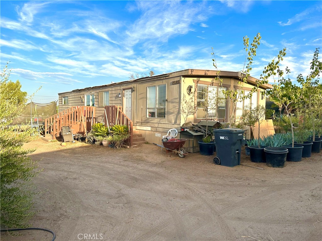 WELCOME TO RURAL, TRANQUIL, AND COUNTRY LIVING. Be suited in this cozy manufactered home that offers more than an acre of peace and oasis. Bring your horses, toys, parties, and accessories!! The home offers three spacious bedrooms and two baths. Don't miss out on viewing this beautiful opportunity!