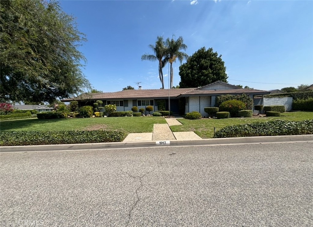 RARE, first time on the market in decades. This beautifully preserved 3-bedroom, 2-bathroom home is located in one of West Covina's most sought-after neighborhoods, offering 1784 square feet of open, inviting living space. Single Story Home Situated on a Spanning Lot. This charming home features manicured landscape with a green lawn. Inside, you will find spacious bedrooms that provide both privacy and comfort, along with two charming fireplaces—one in the dining room and the other in the living room—creating a cozy atmosphere in each space. The full kitchen, along with a cozy breakfast nook and a separate dining area, ensures both functionality and ease for daily living and entertaining. Enjoy the sparkling pool, perfect for family gatherings. There is a permitted room addition on the side of the home, offering potential for an ADU conversion, an extra bedroom, pool house or an office space. Located conveniently near Vine Elementary School and Hollencrest Middle School, this home provides both a comfortable living space and an ideal location. This rare find offers a unique opportunity for anyone seeking charm, comfort, and practicality. Schedule a tour today to experience all that this wonderful home has to offer!