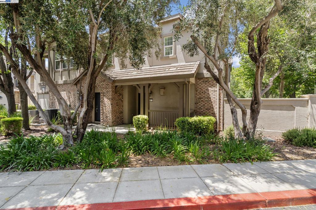 Come & fall in love with 161 W Luna Loca Lane! This charming & move-in ready end unit townhouse style condo is nestled within the highly sought-after Mountain House community. Its bright and open floor plan with engineered hardwood floor & well appointed kitchen is ideal for contemporary living. The primary suite is a luxurious sanctuary, boasting a spacious walk-in closet & an ensuite bathroom for your relaxation. 2 additional bedrooms & a roomy loft ensure there's plenty of room for family or even a home office, with one bedroom and full bath on the first floor. Step into the side yard w/ a charming patio area perfect for al fresco dining and soaking up the sunny Mountain House weather. Great location walking distance from Central Park, basketball and tennis courts, pickleball, playgrounds, trails, picnic spots, and the beloved Sunday Farmers Market. The HOA includes water, trash, sewage, roof maintenance, and all exterior communal areas, allowing you to enjoy a hassle-free lifestyle! Mountain House is a lively and modern city renowned for its top-rated schools, parks, and picturesque walking paths. A short drive from the Bay Area, Mountain House offers harmonious blend of urban amenities and small-town charm. Schedule your tour today and start living you best life!