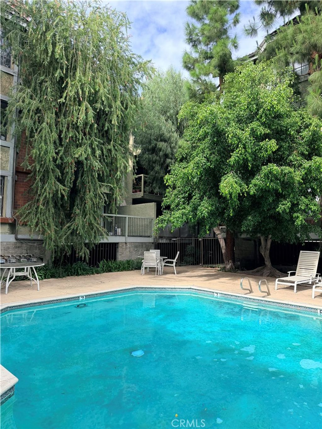Photo of 18324 Clark Street #120, Tarzana, CA 91356 (MLS # SR26095715)
