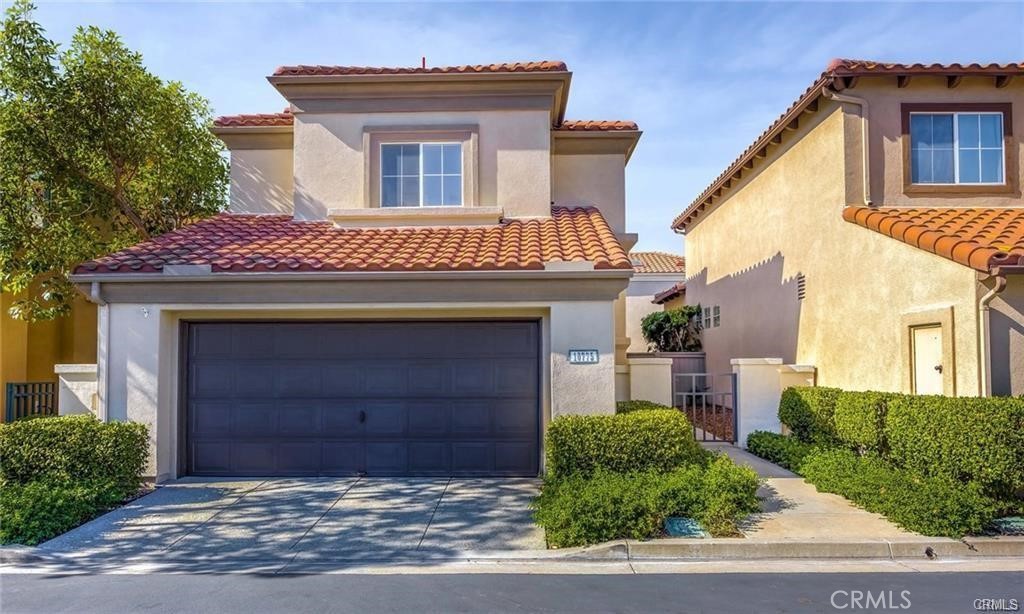 Stunning Tustin Ranch home offers a great layout with maximum use of space well appointed forms living room with fireplace secondary gathering space is available in the family good sized kitchen and tons of cabinet space for all your needs kitchen features a sit up eating bar plus a sunny eating area Holidays will be a breeze with the formal dining room large enough for a party well appointed and all good sized bedrooms upstairs spacious master suite with master bath offers duel vanities shower and separate tub enjoy new wood floors new carpet baseboards gorgeous toned interior paint wonderful community with pool and spa enjoy award wining schools and close proximity to tons of dining shopping and entertainment enjoy the outdoors golf course and peters canyon trails