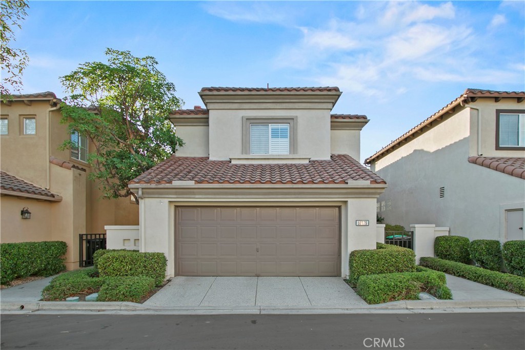 Stunning Tustin Ranch home offers a great layout with maximum use of space well appointed forms living room with fireplace secondary gathering space is available in the family good sized kitchen and tons of cabinet space for all your needs kitchen features a sit up eating bar plus a sunny eating area Holidays will be a breeze with the formal dining room large enough for a party well appointed and all good sized bedrooms upstairs spacious master suite with master bath offers duel vanities shower and separate tub enjoy new wood floors new carpet baseboards gorgeous toned interior paint wonderful community with pool and spa enjoy award wining schools and close proximity to tons of dining shopping and entertainment enjoy the outdoors golf course and peters canyon trails
