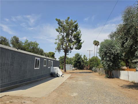 Photo of 18864 Grand Avenue, Lake Elsinore, CA 92530 (MLS # IV26176153)