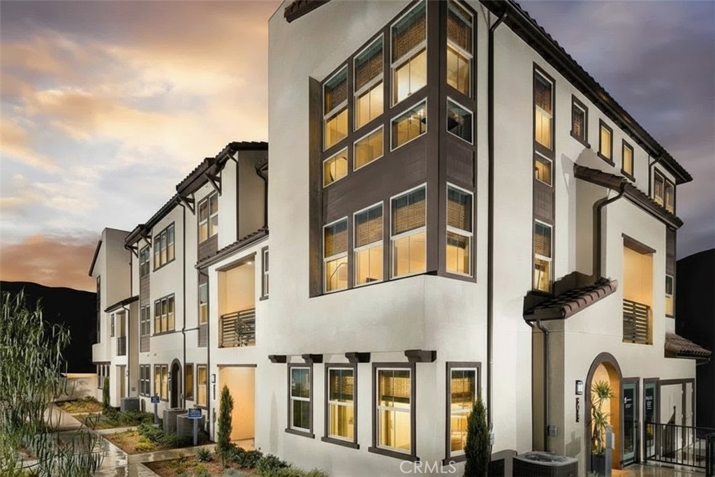Welcome to 5006 Belmont Lane, a beautifully upgraded newer home in the highly sought-after Belmont community of Cypress. This modern townhome offers approximately 1,903 square feet of thoughtfully designed living space, featuring 4 bedrooms and 3.5 bathrooms, including a convenient first-floor bedroom with a full bath. The open-concept layout highlights a spacious great room and a contemporary kitchen with quartz countertops, a large center island, stained wood cabinetry, stainless-steel appliances, and a private balcony perfect for outdoor dining. Designer upgrades include luxury vinyl plank flooring, recessed lighting, and a full smart-home system with a Ring doorbell, Brilliant smart switches, and a smart thermostat. The primary suite features a generous walk-in closet and a beautifully upgraded en-suite bath, complemented by ample storage and an upstairs laundry room.
Additional features include a two-car side-by-side garage with an EV outlet. The Belmont community offers resort-style amenities including a pool, spa, greenbelt, barbecue area, and outdoor seating. Conveniently located near the approved redevelopment of the Cypress race track—soon to feature new shopping, dining, and residential spaces—this home offers modern comfort today and excellent long-term value for the future