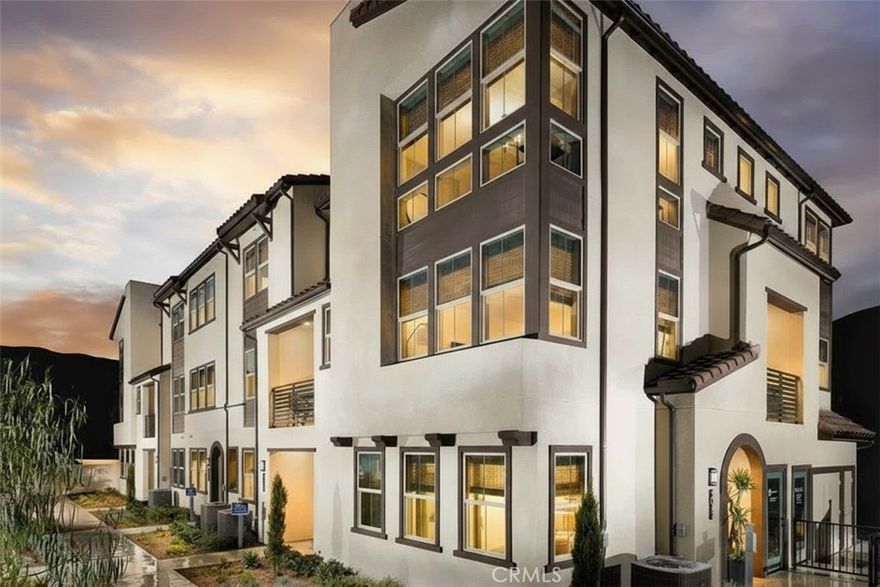 Welcome to 5006 Belmont Lane, a beautifully upgraded newer home in the highly sought-after Belmont community of Cypress. This modern townhome offers approximately 1,903 square feet of thoughtfully designed living space, featuring 4 bedrooms and 3.5 bathrooms, including a convenient first-floor bedroom with a full bath. The open-concept layout highlights a spacious great room and a contemporary kitchen with quartz countertops, a large center island, stained wood cabinetry, stainless-steel appliances, and a private balcony perfect for outdoor dining. Designer upgrades include luxury vinyl plank flooring, recessed lighting, and a full smart-home system with a Ring doorbell, Brilliant smart switches, and a smart thermostat. The primary suite features a generous walk-in closet and a beautifully upgraded en-suite bath, complemented by ample storage and an upstairs laundry room.

Additional features include a two-car side-by-side garage with an EV outlet. The Belmont community offers resort-style amenities including a pool, spa, greenbelt, barbecue area, and outdoor seating. Conveniently located near the approved redevelopment of the Cypress race track—soon to feature new shopping, dining, and residential spaces—this home offers modern comfort today and excellent long-term value for the future