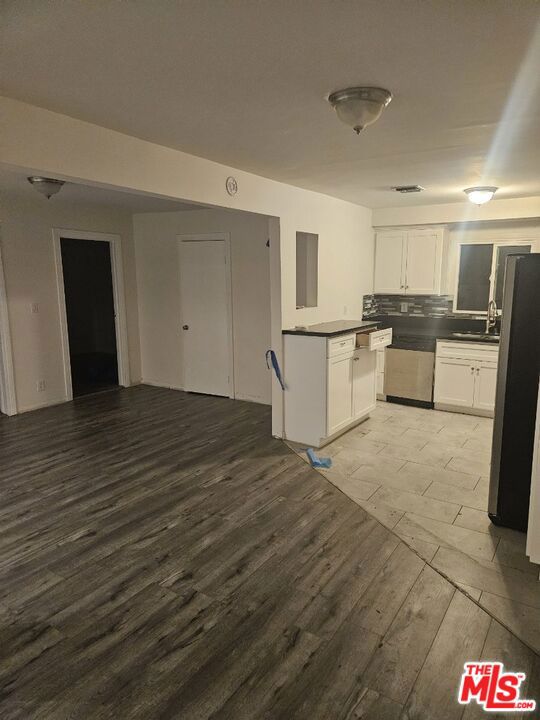 Ready to move in! Newly remodeled 3 bedroom 2 bathroom detached unit feels like a single family home with its own large private back yard. Driveway parking enough to fit 4 cars. Washer and dryer is in the unit. There are only 3 units total in a large quiet lot, so privacy will not be an issue. Pets allowed.