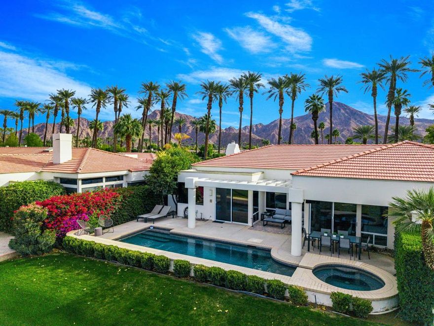 Beautifully appointed home located behind the private gates at Desert Horizons Country Club.Overlooking a double fairway with mountain and lake views!  This popular Troon floor plan offers 2568 square feet with an open concept offering great entertaining space.  Private courtyard entry brings you into the living room with cozy fireplace, wet bar and dining room that is just steps away from the kitchen.  The kitchen offers white cabinetry, gas cook top, free standing island, and breakfast nook that overlooks the family room!  There are 2 primary suites in this home that provides great space and privacy for your guests!  The main primary offers direct access to the pool & spa, soaking tub, walk in shower, water closet, double vanity, and custom walk in closet!  Back patio entertaining with a private pebble pool & spa, and spacious patio for dining or lounging in the sun!  This home has an owned solar system.  There is sizeable storage space in the 2 car garage as well as a golf cart garage!  This home is offered furnished!