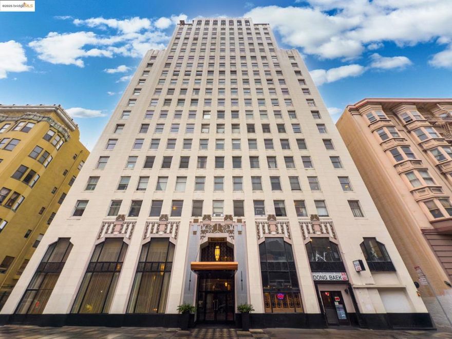 Charming remodeled corner unit condo in the beautiful Hamilton Building with 24 hour door person. Private exterior views of San Francisco, new paint & flooring, mirror closet doors, ceiling fan, newly refinished bathtub & original period details. This building is like a piece of fine art, with soaring high ceiling in the wonderful lobby with grand piano and high-end finishes. Views are stunning from the stylish roof-top deck. You will love this well-preserved time capsule. Close to transportation, restaurants and city night life. Complete with fitness center & HOA costs include heat, water, electricity & trash. Views:  Downtown