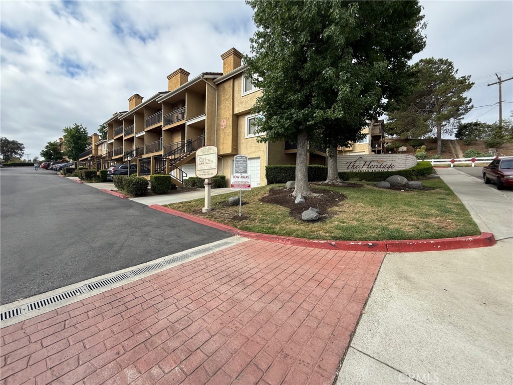 Charming 3-bedroom, 2-bath condo located in the desirable Heritage and Canyon Pointe HOA. This is a top level unit with one assigned parking (#134) and all-electric with no gas. The interior has been freshly painted, new flooring in the main living room areas, decent size kitchen, with granite countertops, appliances included, good size living room, dinning area, with a private balcony. Access to amenities such as pools, a clubhouse, and a fitness center.