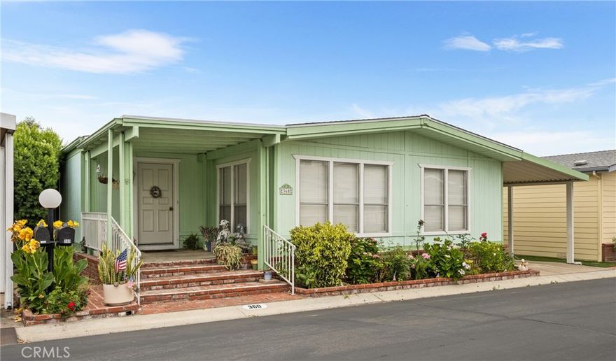 WELCOME TO THIS EXCLUSIVE 55+ COMMUNITY (THE GROVES) WHERE YOU SHARE IN THE OWNERSHIP OF THE LAND EACH HOMEOWNER OWNS 1/533 SHARE OF GROVES HOMEOWNERS, INC. WITH NO RENT SPACE AND LOW MONTHLY MAINTENANCE FEES, 24 HOUR GUARD GATED ENTRANCE LOCATED IN ONE OF THE MOST COVETED SENIOR COMMUNITIES IN ORANGE COUNTY.

THIS EXPANSIVE TWO BEDROOM, TWO BATH HOME HAS BEEN LOVINGLY CARED FOR OVER THE YEARS, UPGRADED FEATURES INCLUDE, LAMINATE COUNTERS IN KITCHEN THAT HAS THE LOOK OF GRANITE, LAMINATE FLOORING THROUGHOUT MAIN ROOMS OTHER THAN CARPET IN BEDROOMS, BRIGHT AND OPEN FLOOR PLAN WITH HIGHER CEILINGS IN LIVING AND FAMILY ROOM AREA, ROOF WAS INSTALLED IN 2021.

BEING A RESIDENT OF THE GROVES OFFERS YOU RESORT STYLE LIVING WITH, FITNESS CENTER, SAUNA, TENNIS, PICKLE BALL, BASKETBALL  LAWN BOWLING, PUTTING GREENS, YEAR ROUND HEATED POOL AND SPA, LOVELY PARK AREA, BBQ AREAS, RV PARKING AND CAR WASH.

MOVE INTO THE CLUBHOUSE AND FIND EVEN MORE FEATURES INCLUDING, CARD ROOMS, BILLIARDS, BANQUET FACILITIES, PING PONG, HAIR SALON, CERAMIC STUDIO,MUSICALS, PLAYS, SHOWS, BINGO, AND A HUGE FOURTH OF JULY PARADE, ALSO A FULLY EQUIPPED WOOD WORKING SHOP, DISCOUNTS IN COX TV AND INTERNET, LAST BUT NOT LEAST IS THE COMMUNITY GARDEN
