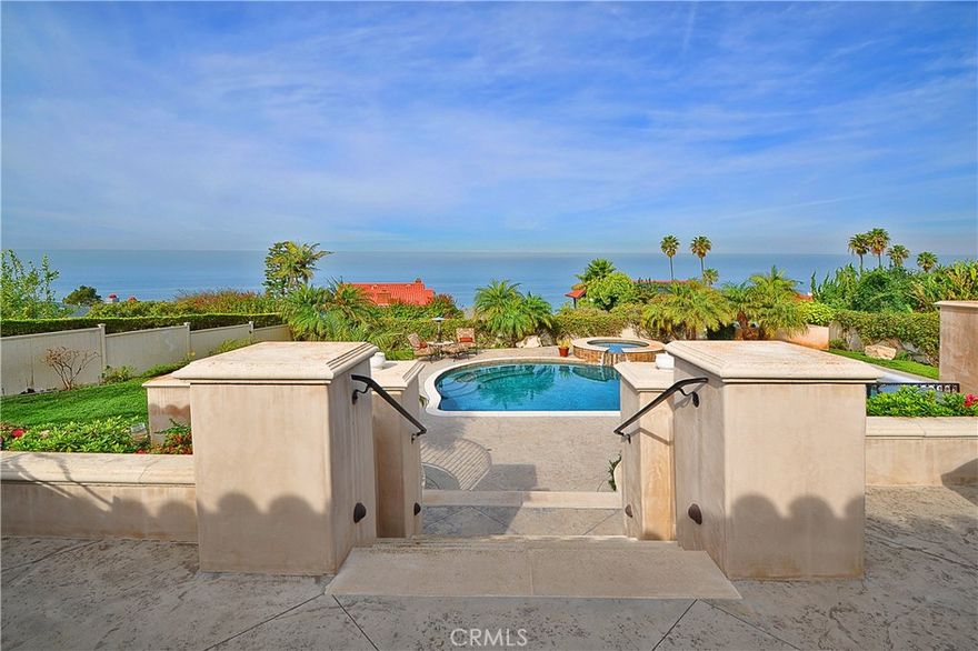 This one of a kind 4-bedroom custom home with resort-like backyard and incredible Malibu to Queen's Necklace view of the Pacific Ocean is located on one of the premier and most sought-after streets in Lunada Bay. This property has only had two owners in the last 75 years. It is rare to come to market. As you walk up to the courtyard entry, you can see straight through to the inspiring ocean view! The home features a formal living room, formal dining room, huge great room with breakfast area, custom built-ins throughout, custom tile work, vaulted ceilings, gourmet kitchen and  loads of extra storage in the garage. Enjoy the gorgeous, private backyard with expansive ocean view with pool, spa, built-in BBQ, and patios galore for entertaining. Do not miss this exceptional property!