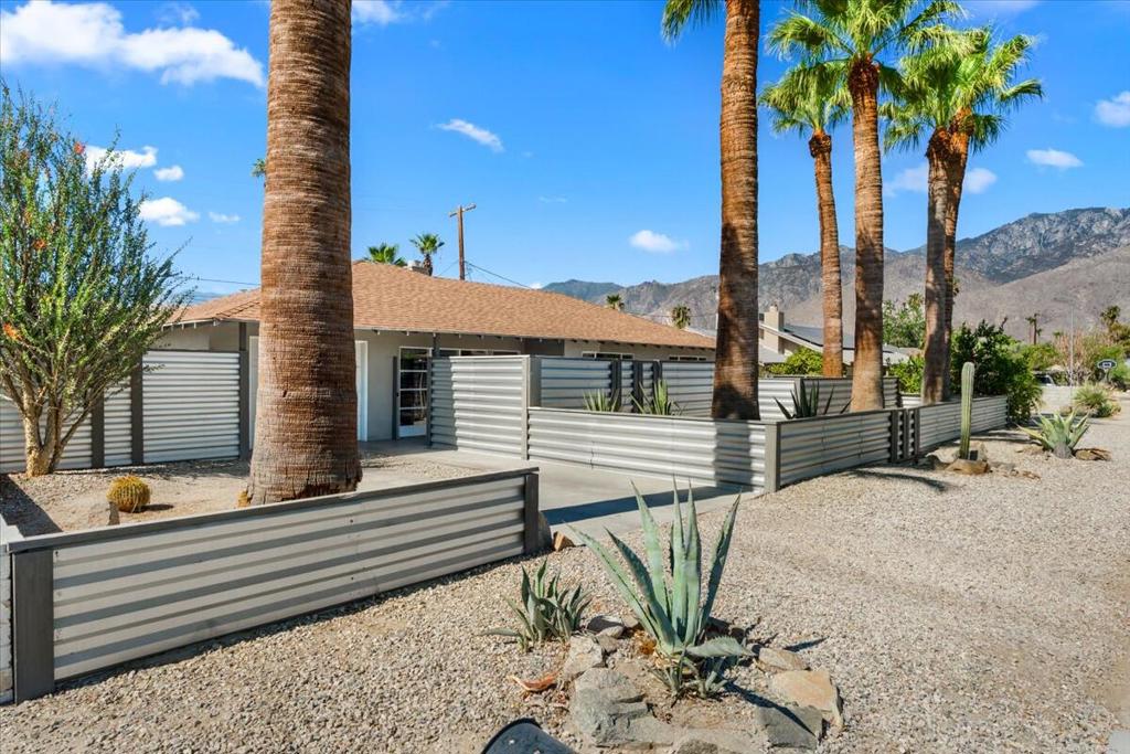 Super charming remodeled bungalow home in up and coming centrally located Demuth Park area. Great room with dining area and fireplace, kitchen with all the modern upgrades including stainless appliances. Front yard is walled for privacy. Back yard with patio and room for a pool. Mountain views. All done and ready for new owners. Leave everything as charming as it is. Many condos - with high HOA's don't offer what this 3 bedroom,1 bath single family home has to offer OR: So many possibilities on this property where there is room for extension of the building, adding pool and spa. Reshaping front and backyard.Demuth park is the last area in town where you can find deals like this. Do not disturb owner. Call for appointments 24 hours in advance.