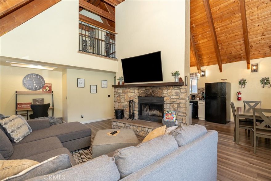 Discover your perfect mountain getaway with this beautiful updated single-family home just about 10 minutes from the ski slopes. Whether you're looking for a full-time residence, weekend escape, or vacation rental, this cozy retreat offers the perfect blend of comfort, style, and location. Step inside to a warm and inviting floorplan featuring a spacious living area centered around a classic stone fireplace- ideal for relaxing after a day on the slopes or gathering with friends and family. The remodeled kitchen shines with modern finishes, sleek cabinetry, and ample counter space, making it a joy to cook and entertain. This 3-bedroom, 2-bath home offers a wonderful balance of indoor and outdoor space. A must see!