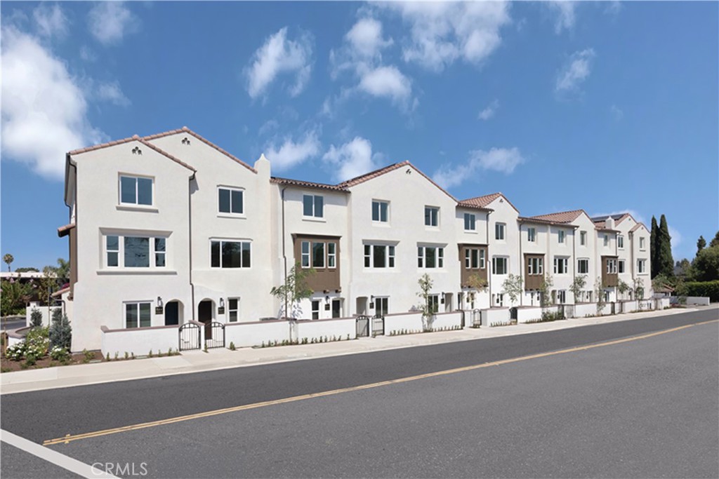 Tesoro Walk is a new gated community, located in the City of Downey, featuring 33 beautiful townhomes.
This Topaz floorplan features a two-car garage, private enclosed patio that leads to your front door, a spacious entryway with a great flex space, and a large coat closet with extra room for storage on the first level. The second floor is your main living level and features a spacious kitchen with large eat-in island, an open living room, and a full bedroom with full bath. On the upper level you'll find a conveniently located laundry room, your large primary suite with walk-in closet and a secondary bedroom with private en-suite bath.