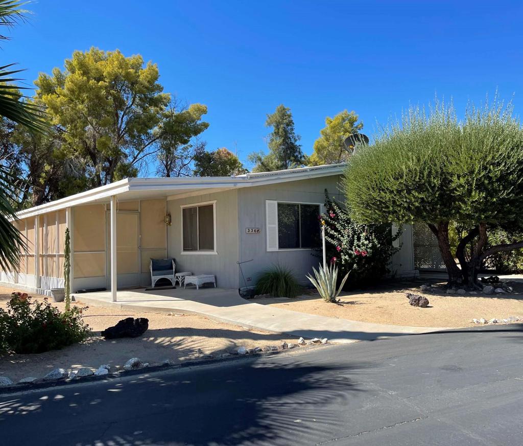 Beautiful home on a large lot the South Greenbelt in The Roadrunner Golf & Country Club. Over a dozen fully mature Citrus fruit trees bearing lots of Fruit. Recently remodeled Kitchen w/new cabinets, countertops, new appliances & Upgrades. New Central Heat Furnace Jan. 2025. Interior walls removed to create Great-room with Textured drywall & bullnose corners. Sliding glass door to Screened-in Borrego Sunroom, fully tiled which leads you out to a gorgeous, newly poured patio and yard with a little white picket fence up against the greenbelt. Offering excellent views of Palm trees & mountain backdrop. New flooring throughout LVP/Tile & Carpeted bedrooms. Remodeled Primary bathroom Shower & counters w/tile upgrades. 55 & up community offers 27 holes of golf, 24hr pool/spa, clubhouse & bbq areas, tennis & pickleball, hiking, bocce ball, shuffleboard & more. All offers subject to Roadrunner Club approval.