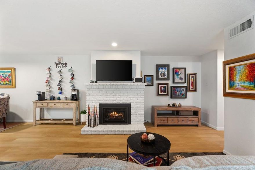 FIVE THOUSAND DOLLARS CLOSING COSTS TO BUYER...!!!-------.BRIGHT, LIGHT & CHEERFUL TOWNHOME -  Centrally-Located, Beautifully Remodeled, Freshly-painted &  Upgraded with Newer Dual-Paned Windows, HVAC, Flooring and Security Screens and Doors. New Fireplace Insert and Remodeled Baths. SLEEK KITCHEN features newer appliances, 'Quartz-Look' Counters, Contemporary Lighting and Added Pantry. Freshly painted first level.    ***DISABILILTY FEATURES Include Highest Quality HOMECARE Brand Stair Chair Lift**** To Upstairs Bedrooms & 2 Full Baths...Generously-Sized Primary Bedroom has Triple Mirrored Closet Doors and Ensuite Full Bath. Cheery end of Hall Bath Services 2 Light and Bright Bedrooms*** Charming Covered Back Patio with Skylights & Slate Tile and Concrete Floors. Pet Gate and Oversized Ceiling Fan. Private Side Entry Gate & Walk Way Creates Quiet Ambience. Close to Town & Shopping. Two Car Garage with Extra Storage & Washer/Dryer Hookups (Set may be negotiable).  ******Refrigerator conveys however ice maker not working.