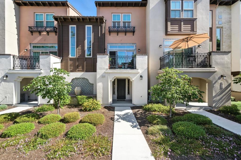 Live your best life where taste & sophistication intersect with functionality in this extremely well designed home! Soaring 10' ceilings & lrg windows w/abundant natural light. Open flr plan on main living level. Private balcony, views of the gorgeous tree lined st. Built in 2021, this spacious home feels modern & many upgrades - including gorgeous hrdwd flooring. Each bedroom, located above the main level, boasts the ultimate privacy with en suite bathrooms and lrg walk-in closets. Relax & unwind in your primary bath while enjoying double sinks, vanity, a large shower w/built-in shower bench & tasteful finishes. Additional storage space & laundry on the 2nd floor add additional convenience to your lifestyle. The kitchen is a chef's dream featuring an enormous island, stainless steel appliances, a high end 6-burner stove, beautiful cabinets which contrast perfectly to the adjacent colors, and beautiful quartz countertops. The added convenience of your 2 car attached private garage complete with a Tier 2 Emporia EV charger makes for easy at-home charging and makes accessing your vehicles a breeze. Enjoy every day in your picturesque Maravilla community complete with fantastic amenities such as a private dog park, car chargers, BBQ area, FP, or relax next to the tranquil fountain.