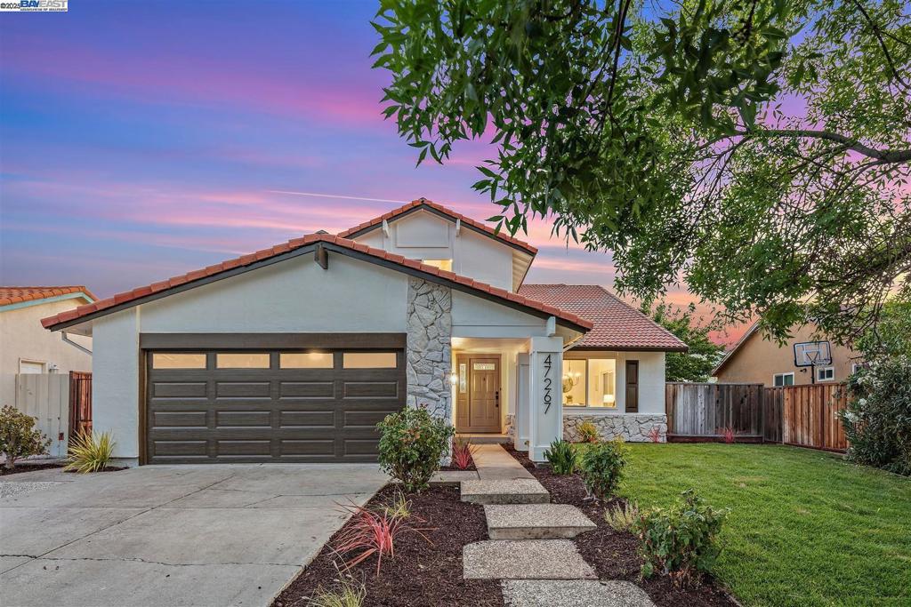 Northeast facing, gorgeous hill views, top-rated schools with some of the highest test scores in all of Fremont, prime neighborhood, and beautifully renovated with almost everything brand new! Located in one of the most desirable Fremont neighborhoods (Warm Springs), this home offers a spacious, open-concept layout on a large fully usable lot, featuring a bedroom and full bath downstairs. Upstairs, it features a spacious primary suite, 2 additional bedrooms, and 2 full baths. Enjoy a light-filled living room and a separate family room with a fireplace and a glass sliding door to the backyard, enhancing the home with natural light. The heart of the home, a fully renovated kitchen, is ready for culinary adventures with new cabinets, quartz countertops, and stainless steel appliances, including a gas stove. Bathrooms have undergone renovations, featuring new vanity sets, updated light fixtures, and a renovated shower/tub! Outside, the property features updated landscaping in both front and backyard, creating a serene outdoor space for relaxation and gatherings. Other wonderful features include central heating and A/C, a well-maintained roof, dual-pane windows, new interior & exterior paint, new light fixtures, new flooring, and much more! Come check it out!