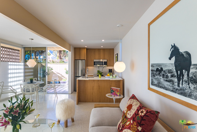 360 Cabrillo Road, Unit 127, has quality workmanship and an extensive use of high-end finishes. Form definitely follows function in this CASH GENERATING Mid-Century modern condominium. Upon entering the property, "light, bright, and airy" comes to mind when describing the living room and open-space concept floor plan. Mountain views seen from every angle of the living room, the expansive windows allow for abundant natural light to fill the rooms. The property boasts natural white oak cabinetry, Samsung appliances, white terrazzo floors throughout, designer fixtures, and a private garden patio. Built in 1959 by Paul Trousdale and designed by William Cody, AIA, one might feel as though they are stepping back in time upon entering this gated historic landmark. If you are searching for that Palm Springs Lifestyle that's in such high demand, look no further!