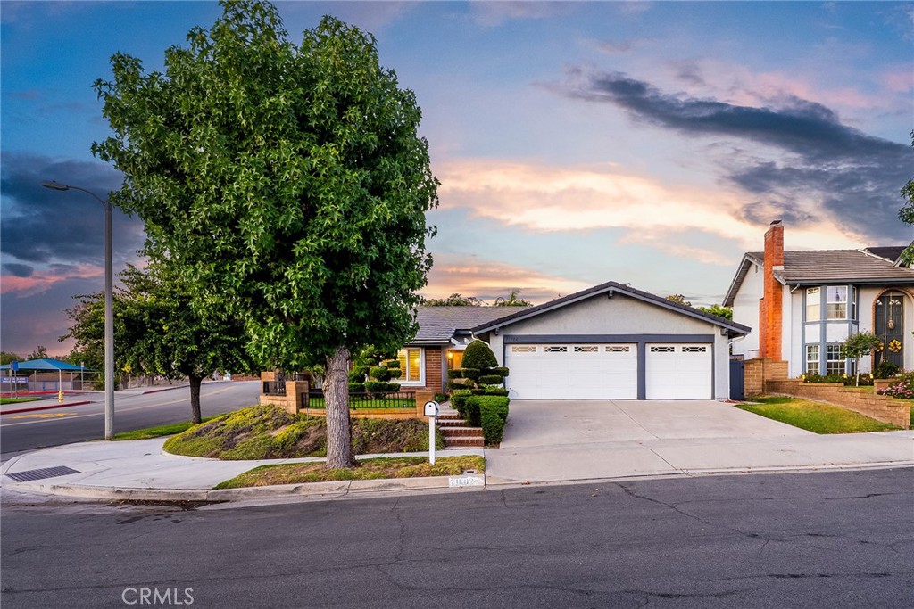 Welcome to 21802 Bass Lake Circle, a beautifully maintained single-story home located on a quiet cul-de-sac in one of Lake Forest’s most desirable neighborhoods. Just a short walk to Rancho Canada Elementary School and Serrano Creek Park, this home offers a spacious open-concept floor plan with vaulted ceilings in the living, formal dining, and family rooms, creating a bright and welcoming atmosphere. The kitchen features a circular countertop perfect for casual gatherings, a gas cooktop, recessed lighting, and ample cabinetry for storage. With 4 generously sized bedrooms and 2 full bathrooms, this layout is ideal for families or anyone seeking single-level living. The primary suite offers vaulted ceilings, dual sinks, a shower/tub combo, and abundant closet space. Interior upgrades include hardwood floors, brand-new carpet, and luxury vinyl plank in the wet areas. Built in 1977 and meticulously cared for, this home also includes a concrete tile roof, a three-car garage with epoxy flooring, storage cabinets, and a water softener system. Situated on a corner lot with no neighbors on one side, the backyard boasts an Alumawood patio cover, outdoor fireplace, grassy play space, and lush greenery. The low monthly HOA of just $112 provides access to the Sun & Sail Club, which features pools, tennis courts, a gym, and a clubhouse with year-round community events. Conveniently located near Heritage Hill Plaza with grocery stores, restaurants, banks, and shops, this home also benefits from low property taxes of approximately 1%. If you’re looking for a well-kept home in a vibrant, walkable community with exceptional amenities, this is the one you’ve been waiting for!