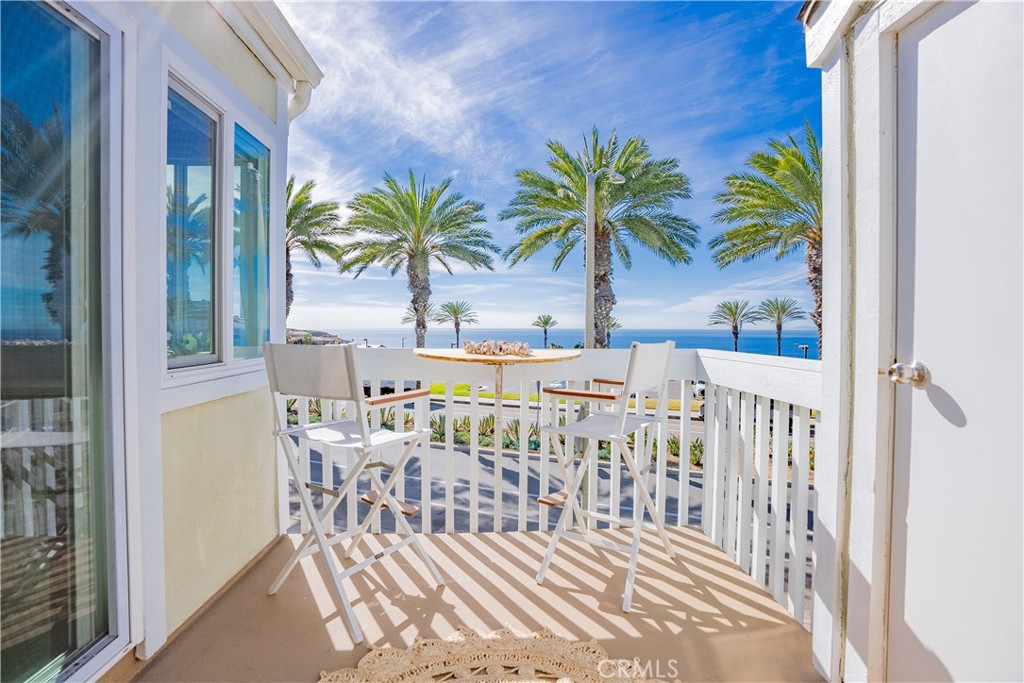 Oceanfront living at its best! Experience coastal luxury in this stunning two-bedroom, two-bath condo located in the highly desirable Niguel Beach Terrace community, directly across from Strand Beach in Dana Point. This front-row, second-level end unit offers breathtaking ocean views from every window and embodies the ultimate beachfront lifestyle. Inside you’ll find an open-concept living space with a cozy fireplace, and 2 private patios perfect for unwinding while soaking in unparalleled ocean views and sunsets. It also includes an in-unit washer and dryer for your convenience. Enjoy the perks of living right in front of Strand Beach, Salt Creek Beach, and the vibrant Dana Point Harbor, offering access to world-class dining, shopping, and recreational activities. This condo is also available as a fully furnished option, making it ideal for an stress-free move-in experience. Don’t miss this rare opportunity to enjoy beachfront living in one of Dana Point’s most sought-after locations!