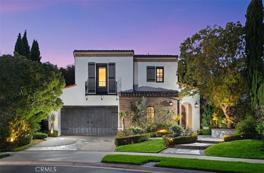 Ideally positioned on a private corner lot at the end of a serene cul-de-sac, 21 Observatory seamlessly blends sophisticated design with luxurious upgrades. This renovated & recently refreshed residence showcases 4 bedrooms, 3.5 bathrooms, and approximately 3,631 square feet of impeccably curated living space. Every detail has been thoughtfully considered from 18”x36” limestone and European oak flooring to custom inlaid cabinetry, striking Calacatta marble countertops, and artisan-crafted ironwork. A state-of-the-art Lutron lighting system sets the perfect ambiance throughout, while a suite of premium Viking and Sub-Zero appliances enhances both function and form in the chef’s kitchen. The garage is a standout feature in itself, offering Cleaf cabinetry which makes it feel more like a high-end showroom than a utility space. Upstairs, the primary suite is a true retreat, featuring warm wood flooring, a stone-wrapped balcony, and a spa-inspired bathroom with marble flooring, an oversized stone shower, freestanding Hydro-spa tub, and a fully customized walk-in closet. Located within a 24-hour guard-gated community, residents enjoy resort-style amenities including an Olympic-sized heated pool, spa, toddler pool, outdoor barbecues, a grand fireplace lounge, and direct access to scenic Coastal Peak Park. Just moments from award-winning schools, upscale shopping, dining, and pristine beaches, this home offers the ultimate in privacy, luxury, and lifestyle.