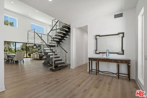 Photo of 11091 Woodcrest Court, Chatsworth, CA 91311 (MLS # 26639541)