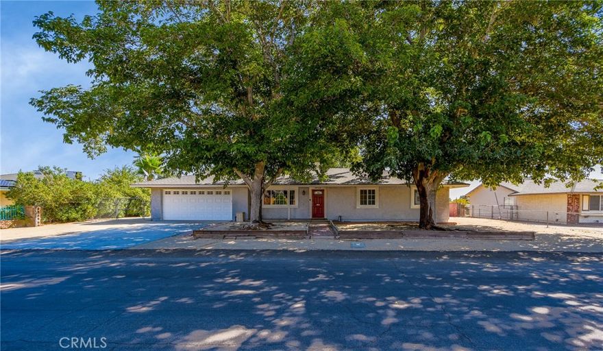Discover the perfect blend of comfort, space, and country charm with this beautiful 3-bedroom, 2-bathroom home located in the peaceful community of Lake Los Angeles. Sitting on just under three-quarters of an acre (30,524 sq ft), this property offers endless possibilities, from RV parking to keeping farm animals and horses. The home features a bright and open layout filled with natural light, a spacious bonus room for added flexibility, and durable tile flooring throughout. A two-car attached garage provides convenience, while an additional detached garage/workshop in the back offers plenty of space for storage, hobbies, or projects. The property is completely fenced, with a well-manicured front and backyard that create a private, inviting retreat. Whether you’re enjoying the wide-open skies and mountain views, entertaining in the backyard, or simply relaxing indoors, this home is designed to embrace the best of desert living while offering modern comfort and functionality.