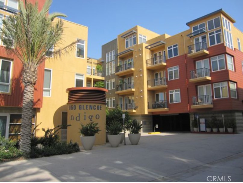 FOR SALE | LEASE WITH OPTION TO BUY | RENT
Spectacular and spacious, this 1-bedroom, 1.5-bathroom single-level penthouse is located in the heart of the Marina Del Rey Arts District just two blocks from the beach. Light-filled and thoughtfully designed, the open floor plan features soaring ceilings, rich wood floors, custom window shades, and a cozy fireplace. The chef’s kitchen is equipped with granite countertops, a breakfast bar, and premium Viking stainless steel appliances, ideal for both entertaining and everyday living.
The generously sized primary suite offers double closets and a spa-like en-suite bathroom with a dual vanity, separate glass-enclosed shower, and deep soaking tub. A stylish powder room is conveniently located off the main living area for guests. Step outside to your private balcony with turf your own serene retreat for morning coffee or relaxing evenings. The unit also includes central HVAC, in-unit laundry, and two assigned side-by-side garage parking spaces.
Residents of this well-maintained building enjoy a full suite of luxury amenities, including a state-of-the-art fitness center, spa, sauna, steam room, hot tub, BBQ area, meeting room, and ample guest parking. With close proximity to shops, dining, entertainment, and easy freeway access, this home offers the perfect balance of coastal living and modern convenience.